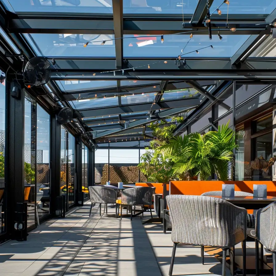 hotel outdoor terrace covered by aluminum and glass patio retractable roof