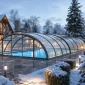 Curved retractable pool enclosure for winter snow areas