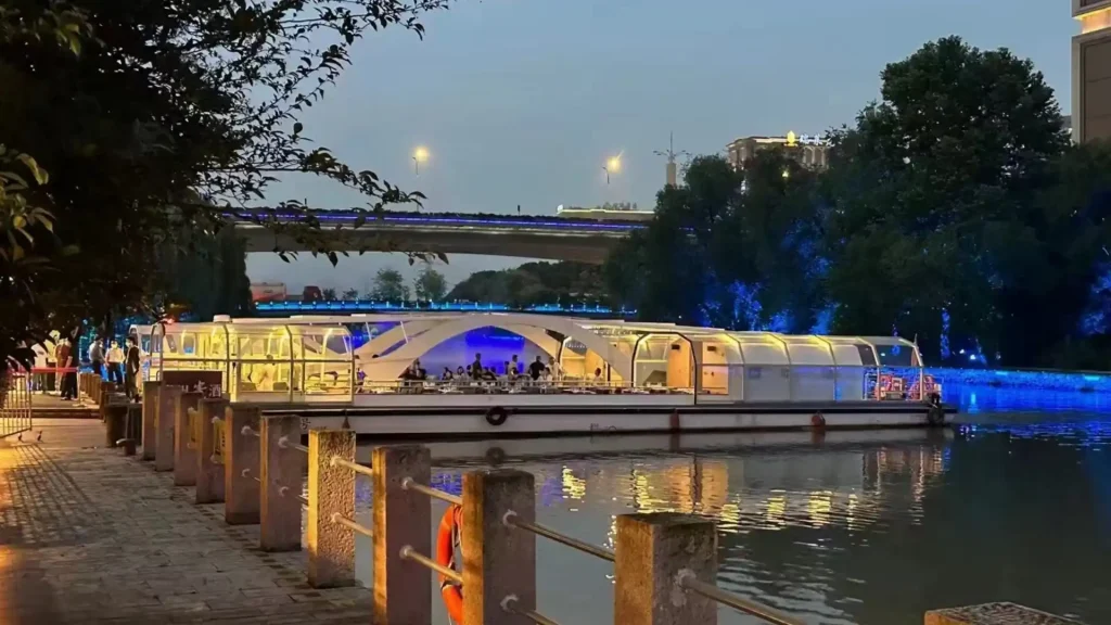 Sightseeing boat sunroom on water in Hangzhou China