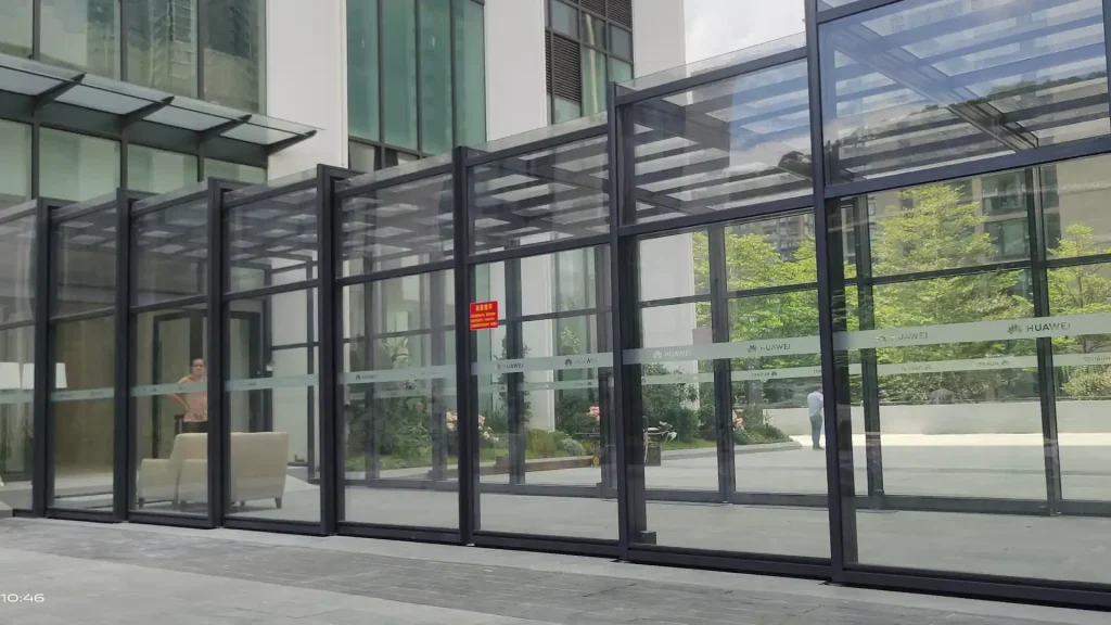 Glass sunroom entrance for corporate office campus