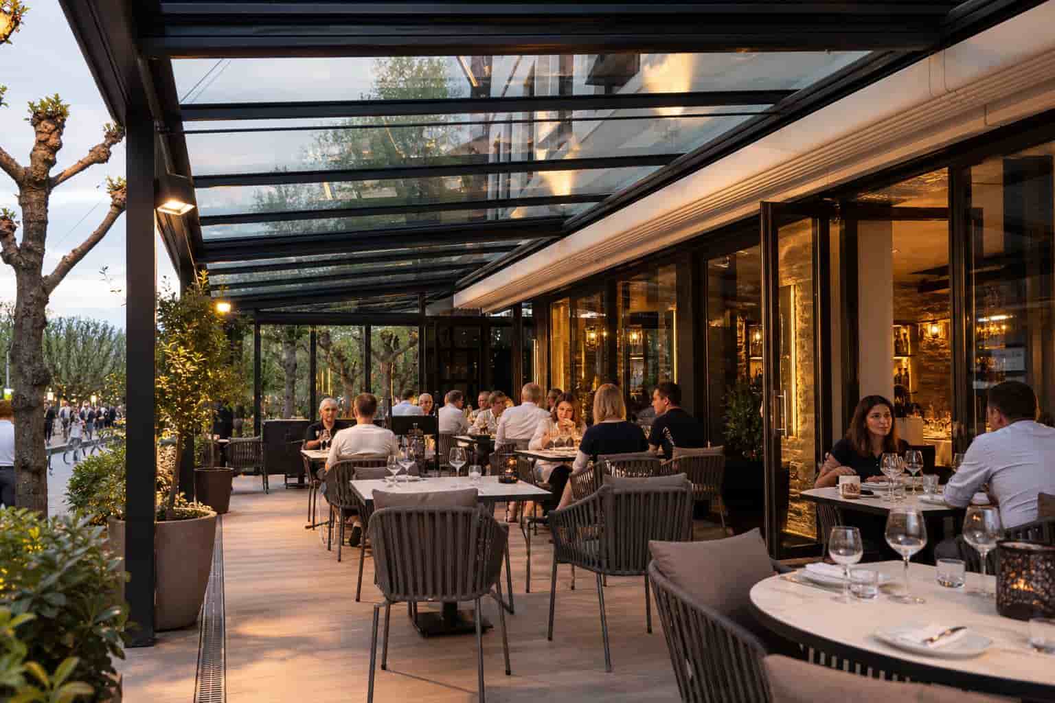 motorized retractable roof system for restaurant outdoor dining terrace