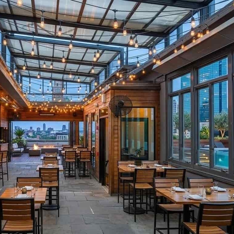 luxury hotel lounge covered by retractable glass roof system