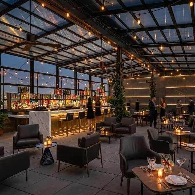 resort courtyard dining area with retractable glass roof system