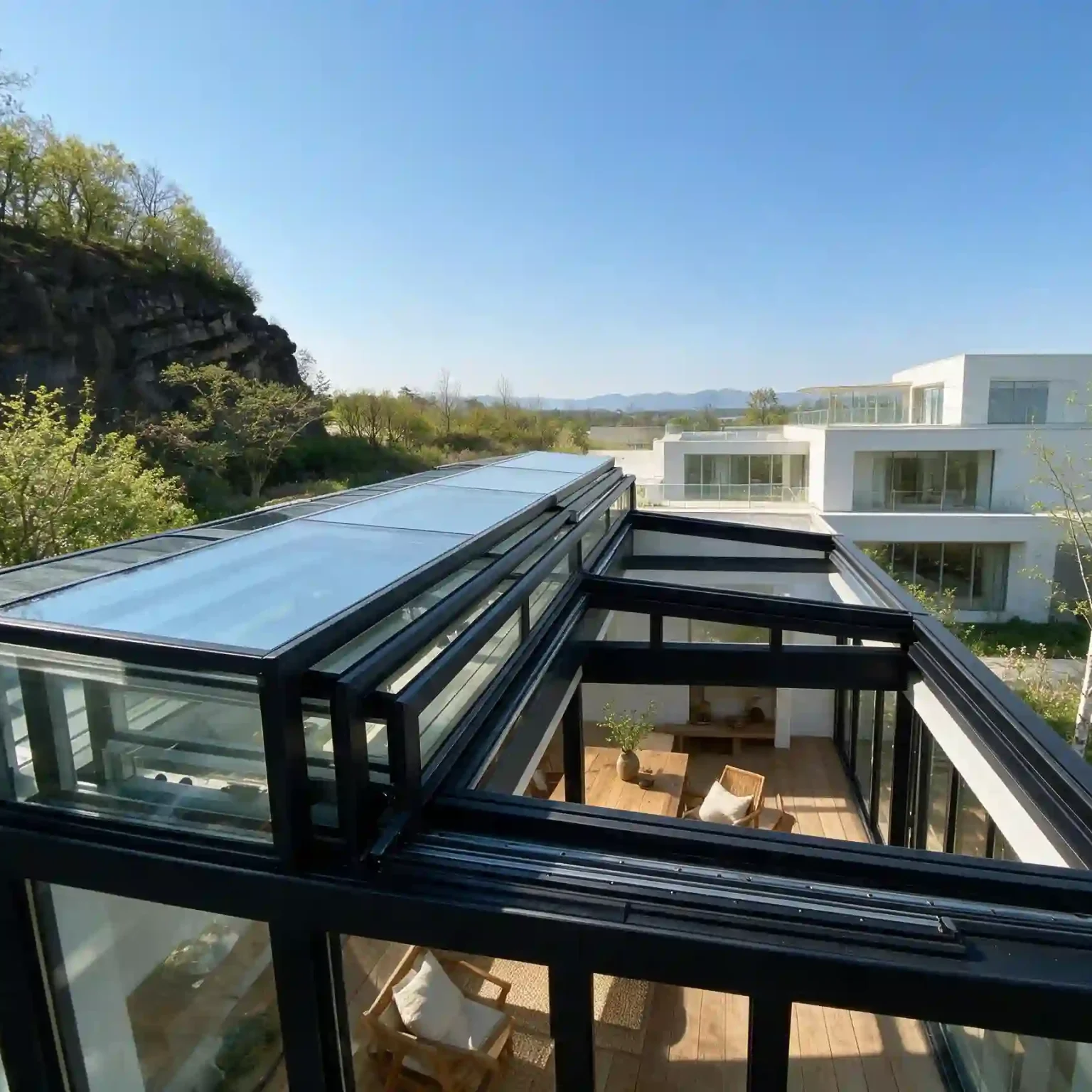 Restaurant atrium retractable glass roof system with indoor dining and natural daylight