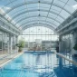 Hotel pool sunroom enclosure design for guest comfort
