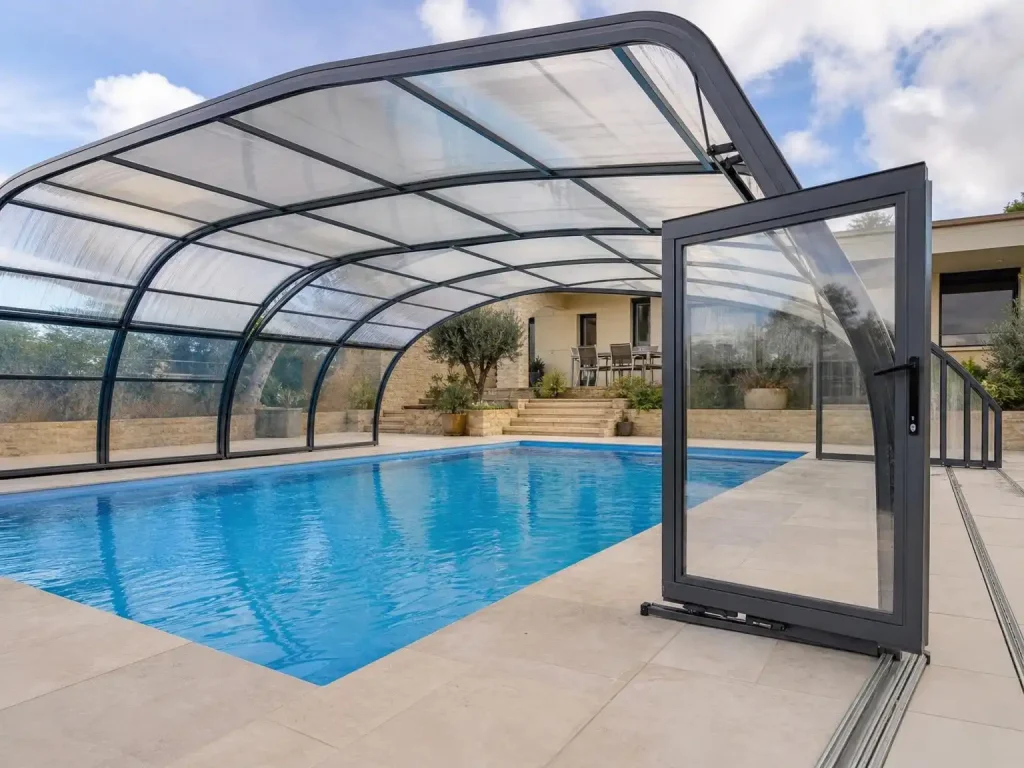 Polycarbonate retractable pool enclosure with aluminum frame