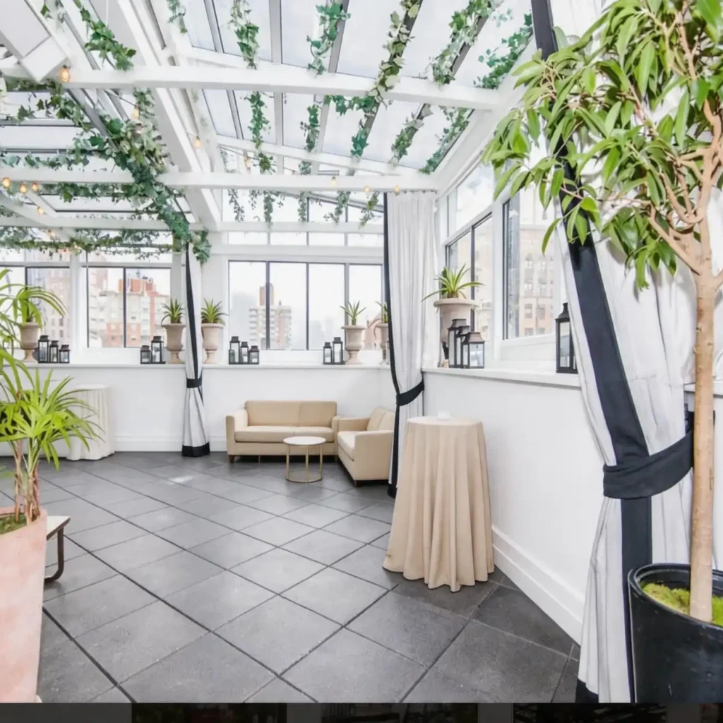 Private rooftop leisure space with retractable sunroom and white aluminum frame