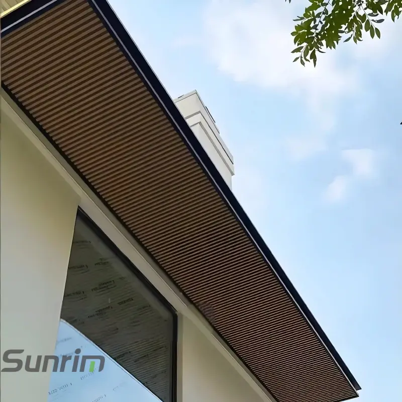 Custom all-aluminum entrance canopy with wood grain ceiling panels