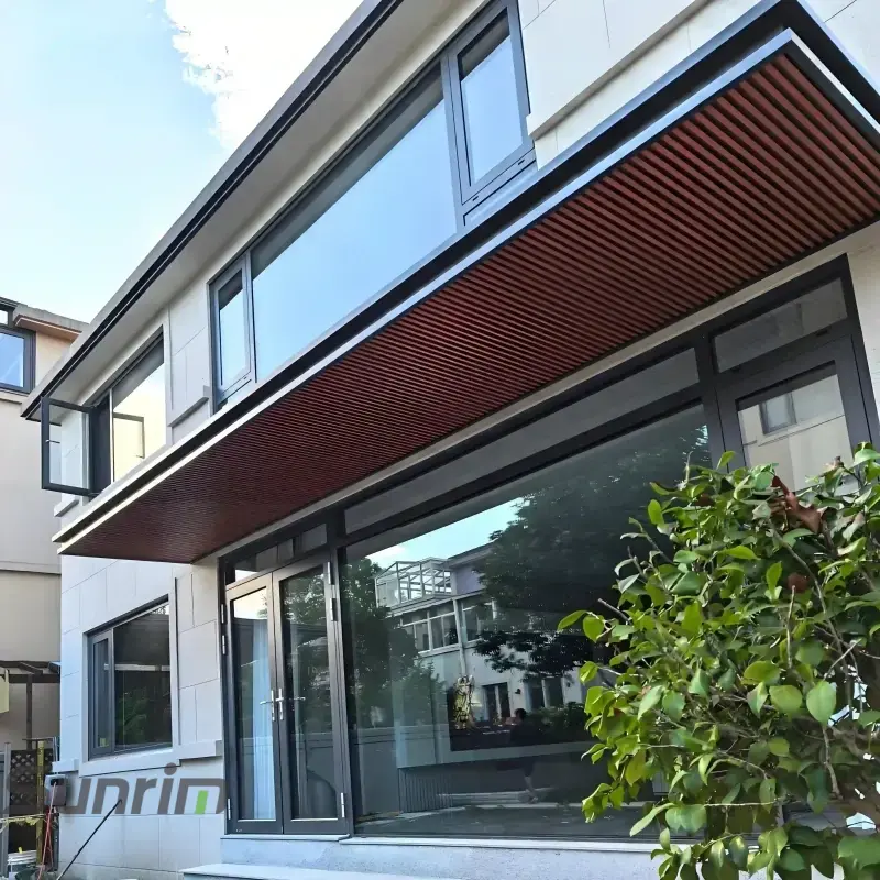 Long aluminum canopy awning for commercial storefront and building entrance