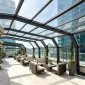 Restaurant rooftop retractable roof for outdoor dining area