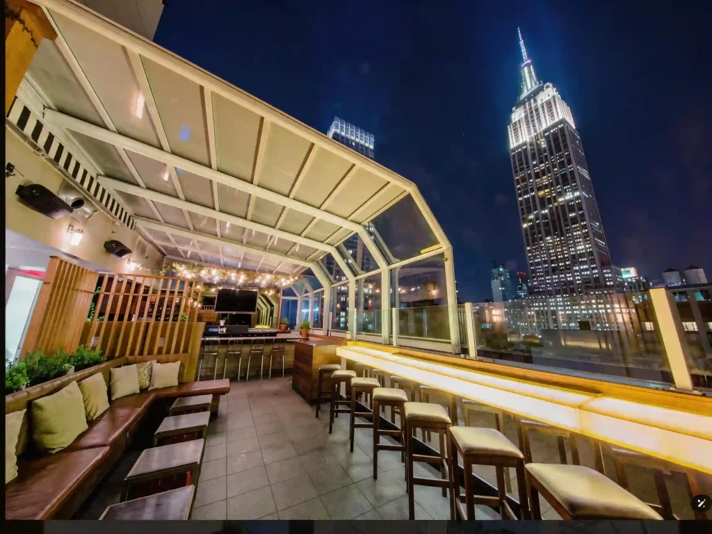 Rooftop restaurant retractable roof system for commercial outdoor dining